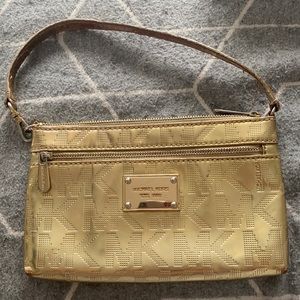 Michael Kors wristlet gold